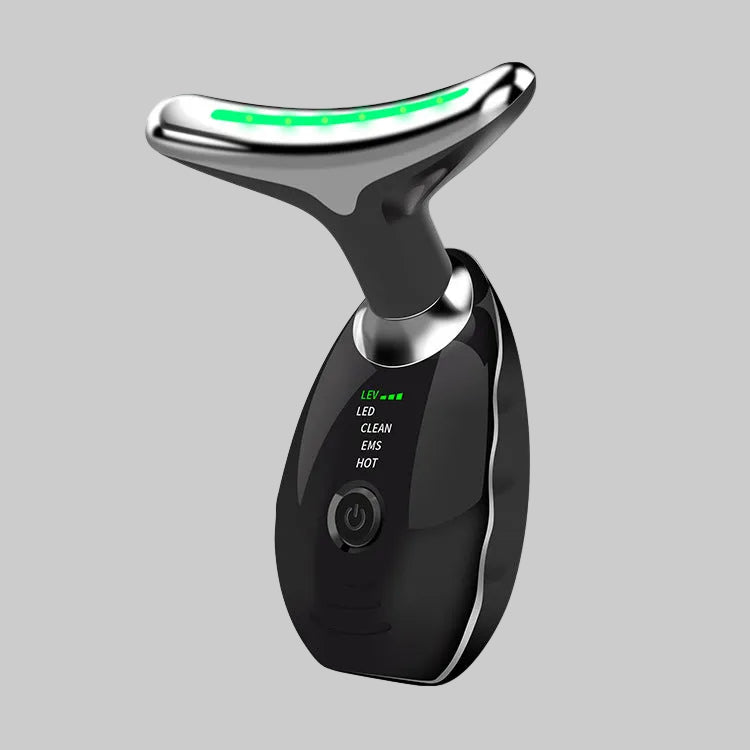 Black electronic   vega device with a green light on a white background